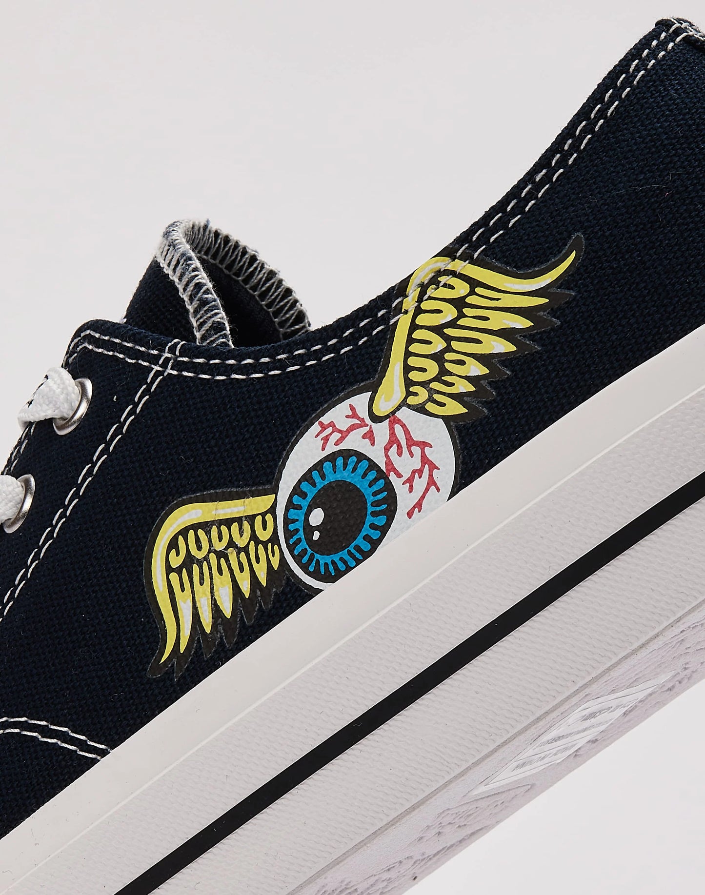 Winged Eye Canvas Sneakers